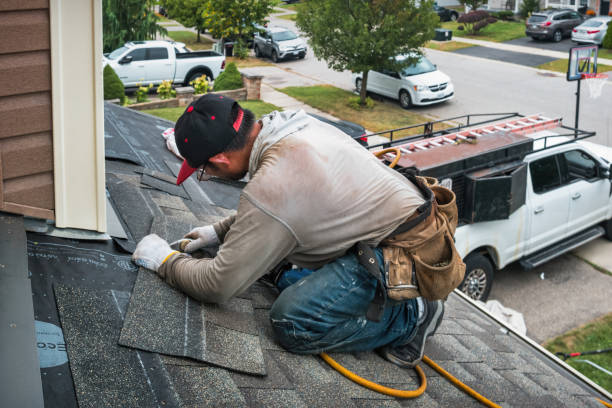 Professional Gutter Repair And Installation technician working in Hesston, KS
